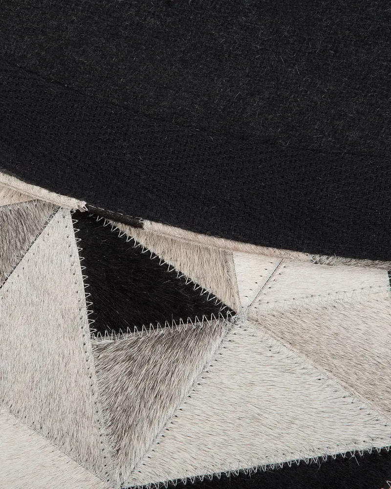 Tappeto pelle color grigio e nero rotondo ⌀ 140 cm KIRKLAR