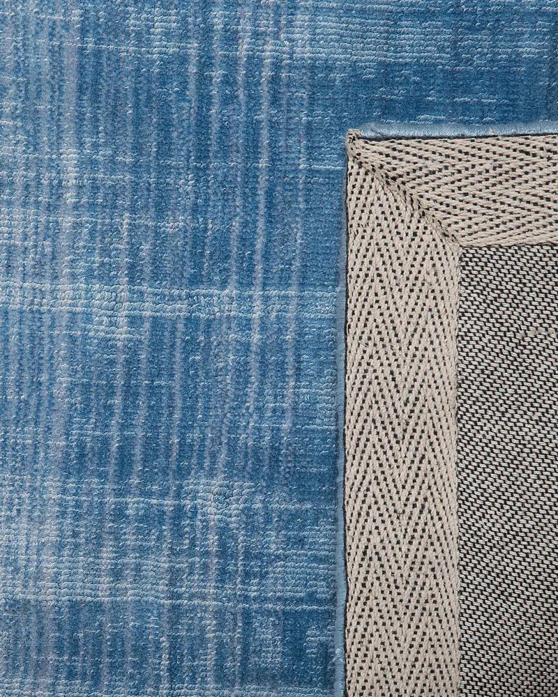 Tappeto pelo breve grigio-blu 140 x 200 cm ERCIS