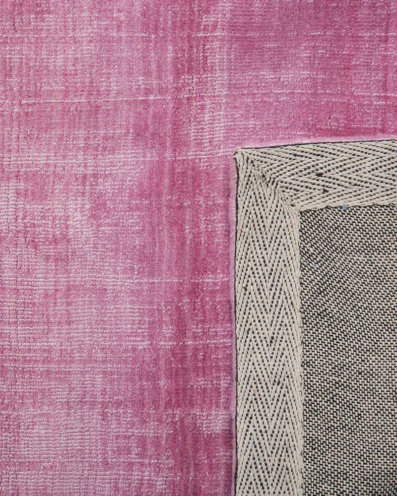 Tappeto pelo ridotto grigio-rosa 140 x 200 cm ERCIS