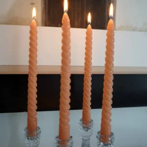 Candele dal design spirale color pesca
