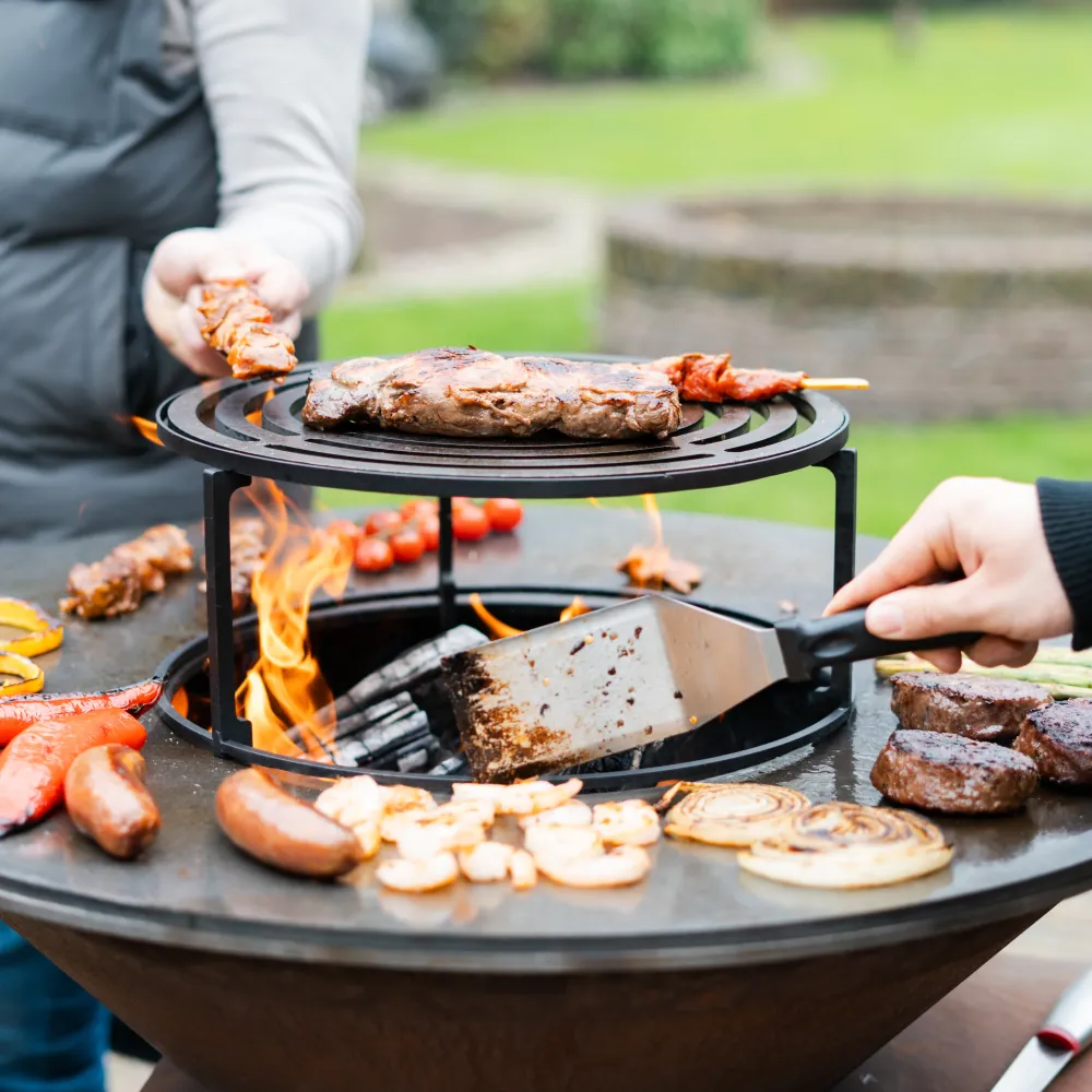 BBQ Plancha Grill Compañero XXL Corten Steel 2.0 - Con attizzatoio e porta legna Ø80cm