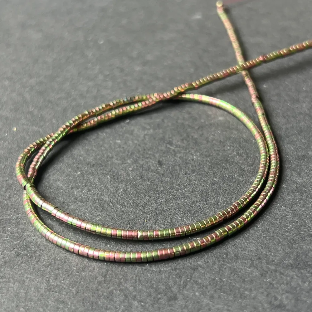 Filo di perle pietre semipreziose HEMATITE RAINBOW