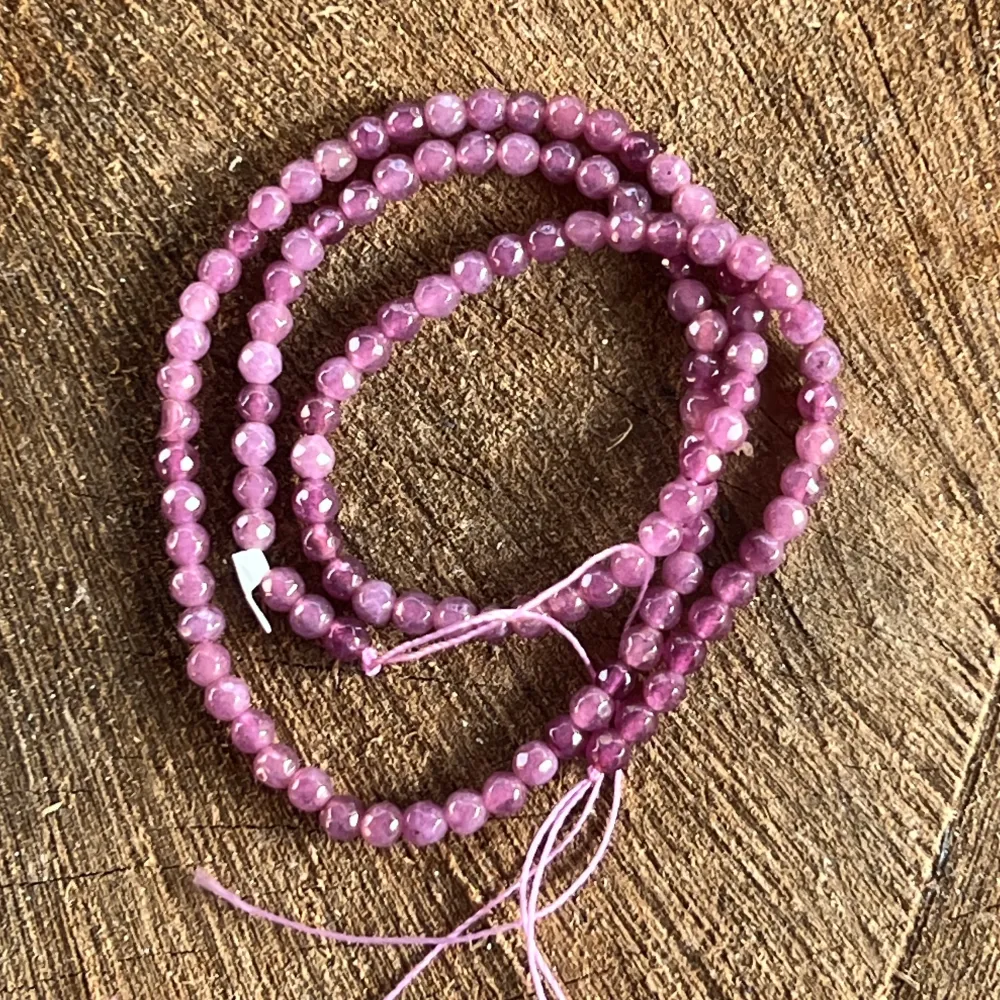 Filo di perle pietre semipreziose sfere sfaccettate AGATA VIOLA