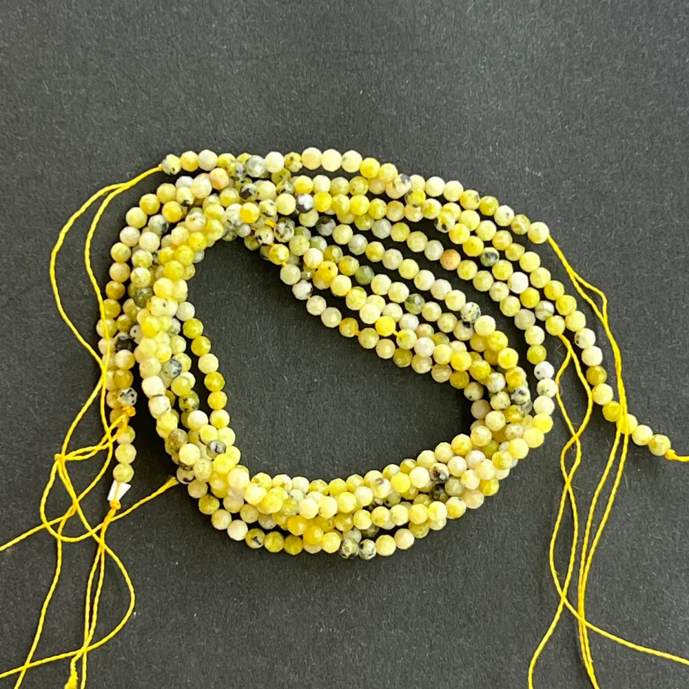 Filo di perline pietre semipreziose sfere sfaccettate SERPENTINO
