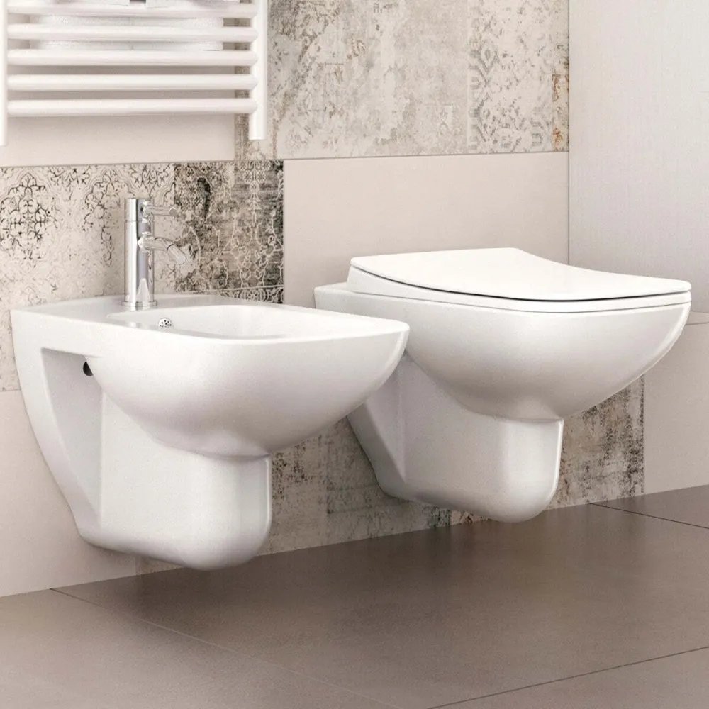 Sanitari Sospesi Filo Muro ceramica bianca con copri vaso frizionato Glam