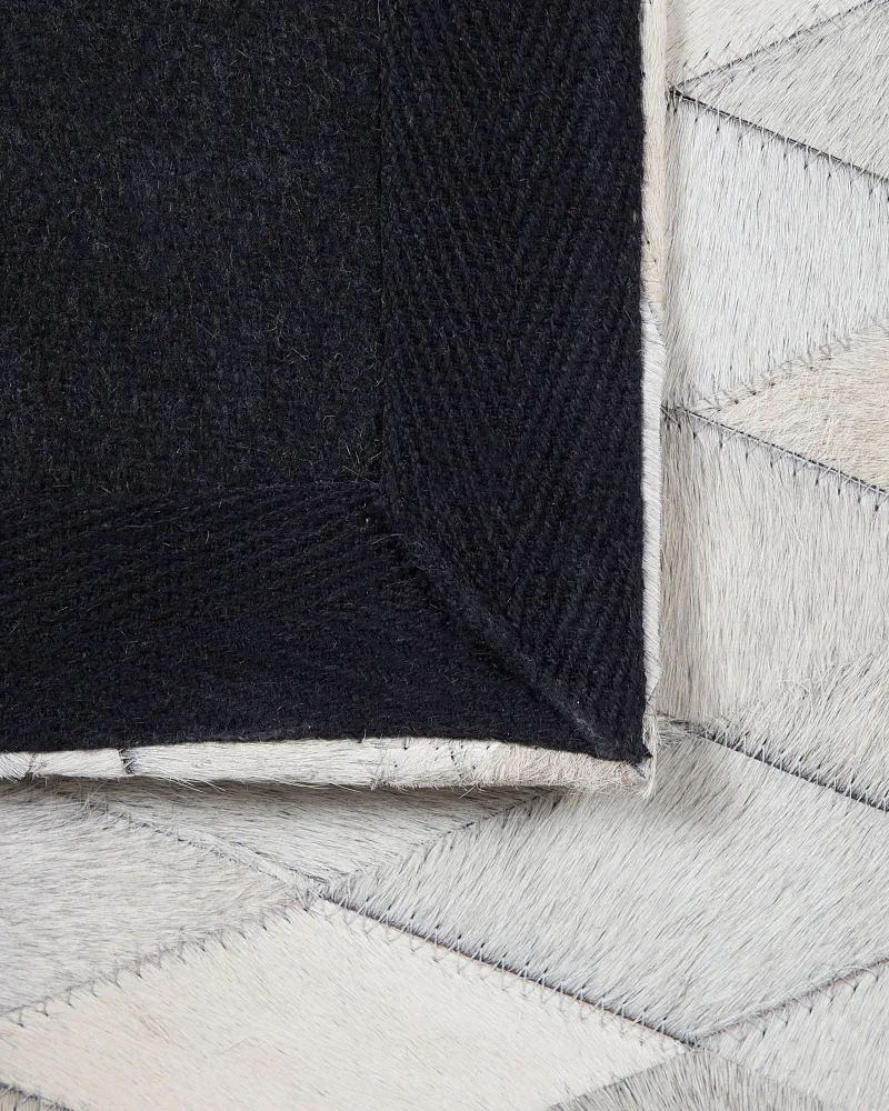 Tappeto pelle bianco / nero 160 x 230 cm MALDAN