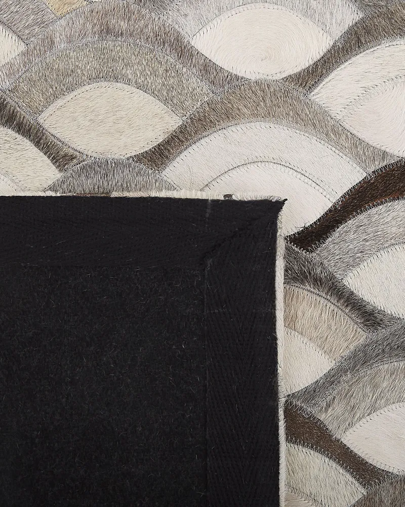 Tappeto pelle marrone e nocciola 140 x 200 cm KIRCA