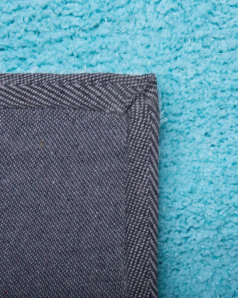 Tappeto shaggy azzurro tondo ⌀ 140 cm DEMRE