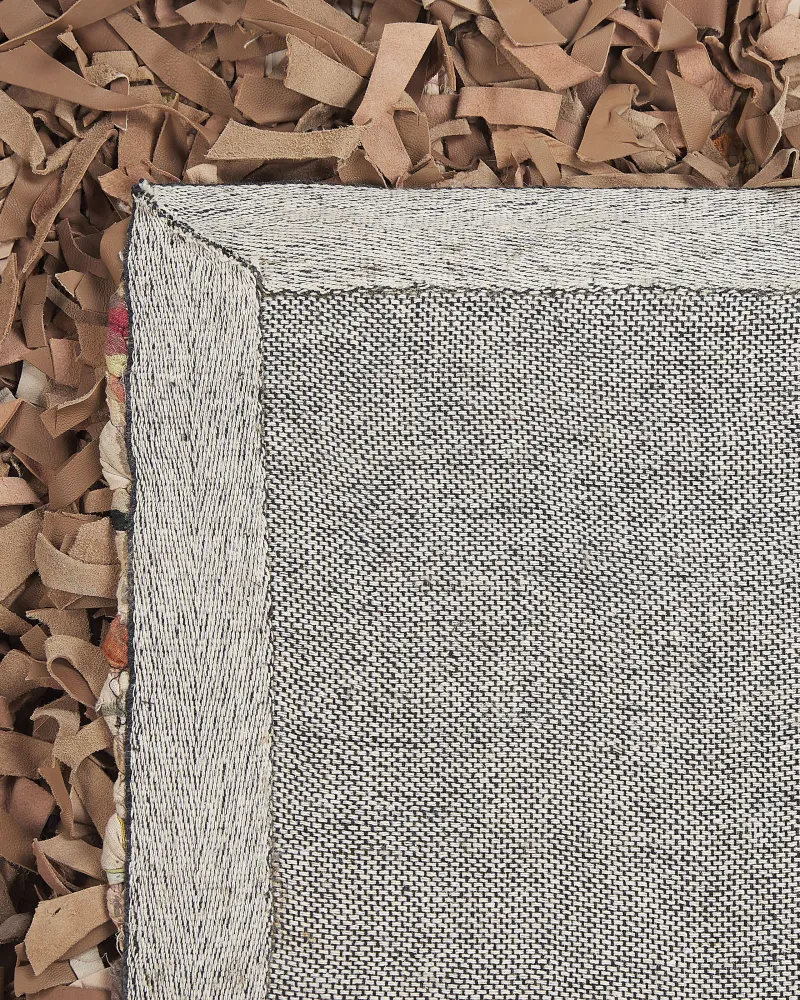 Tappeto shaggy pelle panna 140 x 200 cm MUT