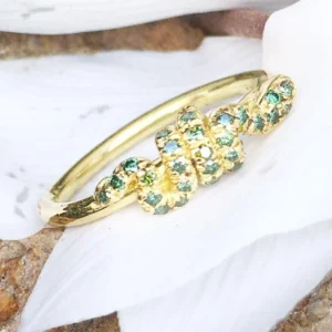 Serpentino oro e diamanti verdi