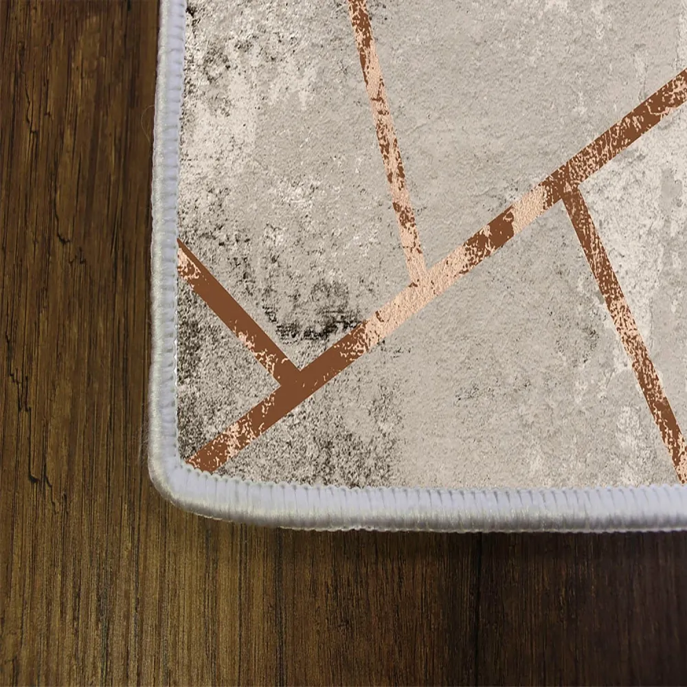 Tappeto Ken 160x230cm Sabbia effetto cemento e linee geometriche astratte Oro